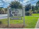 Sign for Wando Woods community, established in 1950 at 4701 Apple St, North Charleston, SC 29405