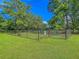 Fenced dog park on lush green lawn with signage and benches for community enjoyment at 4701 Apple St, North Charleston, SC 29405