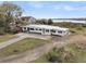 Stunning waterfront home featuring a clean design, beautiful landscaping, and serene water views at 4701 Apple St, North Charleston, SC 29405