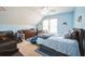 Cozy bedroom with vaulted ceilings, ceiling fan, and natural light at 527 W Butternut Rd, Summerville, SC 29483