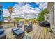 Inviting outdoor deck with comfortable seating area overlooking the backyard and pool at 527 W Butternut Rd, Summerville, SC 29483