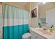Bathroom featuring a shower with a curtain, toilet, vanity, and medicine cabinet at 5276 7Th Green Dr, Hollywood, SC 29449