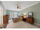 Comfortable bedroom featuring a ceiling fan, neutral paint, and natural light from the exterior window at 5276 7Th Green Dr, Hollywood, SC 29449