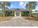 Inviting building with lush greenery, providing a welcoming entrance and beautiful curb appeal at 5276 7Th Green Dr, Hollywood, SC 29449