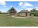 Community grounds featuring a picnic structure and bath house, perfect for outdoor gatherings and recreation at 5276 7Th Green Dr, Hollywood, SC 29449