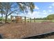 Community playground featuring a slide, swings, climbing structure, and open green space for recreational activities at 5276 7Th Green Dr, Hollywood, SC 29449