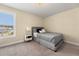 Comfortable bedroom offering natural light and a stylish gray bed frame at 547 Pontoon Rd, Huger, SC 29450