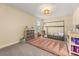A bedroom featuring a unique bed frame, neutral walls and carpet, and natural light at 547 Pontoon Rd, Huger, SC 29450