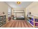 Charming bedroom with a unique canopy bed, plush rug, and ample storage at 547 Pontoon Rd, Huger, SC 29450