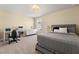 Cozy bedroom featuring a desk, modern dresser, and natural lighting at 547 Pontoon Rd, Huger, SC 29450