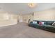 Spacious bonus room with neutral walls and carpet, offering plenty of space for leisure and recreation at 547 Pontoon Rd, Huger, SC 29450