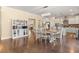 Dining room with hardwood floors and built-in cabinets on the opposite side of the room at 547 Pontoon Rd, Huger, SC 29450