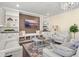 Cozy living room with built-in shelving, a television, and comfortable seating at 547 Pontoon Rd, Huger, SC 29450