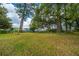 Large backyard with mature trees that provides plenty of shade at 6018 Ridgecrest Ave, Hanahan, SC 29410