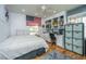 Bedroom with a built-in study nook and an American flag hanging on the wall at 6018 Ridgecrest Ave, Hanahan, SC 29410