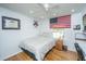 Bedroom with an American flag hanging on the wall next to the window at 6018 Ridgecrest Ave, Hanahan, SC 29410