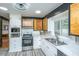 Bright kitchen boasts stainless appliances, white cabinets, a double basin sink, and wood accents at 6018 Ridgecrest Ave, Hanahan, SC 29410