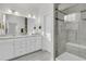 Bright bathroom featuring a double vanity, modern fixtures, and glass-enclosed shower at 614 Beach Way, Summerville, SC 29486