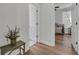 Hallway view with a bedroom featuring a bed and natural light coming in through a window at 614 Beach Way, Summerville, SC 29486