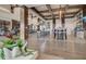 Inviting common area with high ceilings, wood beams, and dining spaces perfect for gathering and socializing at 614 Beach Way, Summerville, SC 29486