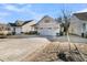 Well-maintained home with a two-car garage and beautifully landscaped yard, complemented by mature trees and a brick-lined driveway at 614 Beach Way, Summerville, SC 29486
