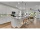 Well-lit kitchen with a spacious island, stainless steel appliances, and an open layout at 614 Beach Way, Summerville, SC 29486
