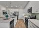 Bright kitchen featuring stainless appliances, ample counter space, and modern finishes at 614 Beach Way, Summerville, SC 29486