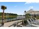 Lakeside lounge area with comfortable seating and scenic views, providing a tranquil and picturesque setting at 614 Beach Way, Summerville, SC 29486