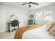 Bedroom featuring a ceiling fan, large window, desk, and closet at 68 Oyster Point Row, Charleston, SC 29412