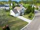 Aerial view of a home with a well-manicured lawn and garden in a suburban neighborhood at 7483 Hawks Cir, Hanahan, SC 29410