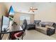 Comfortable bedroom featuring a flat screen television, desk and gaming chair plus additional seating at 7483 Hawks Cir, Hanahan, SC 29410