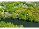 Lush trees surrounding houses and waterway, creating a serene environment at 753 Lake Frances Dr, Charleston, SC 29412