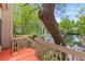 Inviting backyard deck offers scenic views of the serene waterfront, creating an idyllic retreat at 753 Lake Frances Dr, Charleston, SC 29412