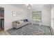 Comfortable room with sofa, natural light and a cozy atmosphere, complete with a stylish rug at 753 Lake Frances Dr, Charleston, SC 29412