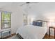 Comfortable bedroom with natural light and scenic water view through windows at 753 Lake Frances Dr, Charleston, SC 29412