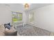 Comfortable room with sofa, natural light and a cozy atmosphere, complete with a stylish rug at 753 Lake Frances Dr, Charleston, SC 29412