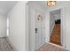 Inviting foyer with tiled floor, front door with sidelight, and staircase access at 753 Lake Frances Dr, Charleston, SC 29412