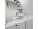 Efficient laundry room with a washer, dryer, and storage shelves for organized convenience at 753 Lake Frances Dr, Charleston, SC 29412