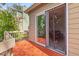 Charming wood patio with a sliding glass door entrance to a dining area inside at 753 Lake Frances Dr, Charleston, SC 29412