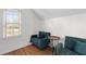 Cozy sitting area featuring plush seating, wood floors and a bright window at 753 Lake Frances Dr, Charleston, SC 29412