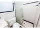 Bathroom featuring a toilet and shower, complemented by tiled walls for easy maintenance at 783 Dills Bluff Rd, Charleston, SC 29412
