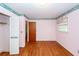 Bedroom featuring hardwood floors with closet and doorway that leads into the next room at 783 Dills Bluff Rd, Charleston, SC 29412