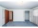 Bedroom featuring carpeted floors with closet and doorway that leads into the next room at 783 Dills Bluff Rd, Charleston, SC 29412