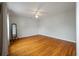 Spacious bedroom featuring hardwood floors and a ceiling fan at 8 Poulnot Ln, Charleston, SC 29401