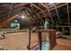 Unfinished attic space featuring exposed wooden beams, offering potential for storage or customization at 803 S Main St, Summerville, SC 29483