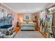 Bright bedroom with an area rug, a chandelier, and a neutral color palette at 803 S Main St, Summerville, SC 29483