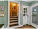 Inviting entryway with decorative details and a staircase to the upper level at 803 S Main St, Summerville, SC 29483