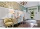 Inviting foyer featuring hardwood floors, a stylish console table, and decorative lighting, offering a warm welcome at 803 S Main St, Summerville, SC 29483