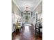 Spacious foyer featuring hardwood floors, elegant lighting, and stylish furnishings, creating a welcoming entry at 803 S Main St, Summerville, SC 29483