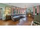 Open-concept living room with hardwood floors, fireplace, and a comfortable sectional sofa at 803 S Main St, Summerville, SC 29483